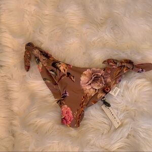 Vitamin A Gidget Brazilian cut floral bikini bottoms with adjustable side tie.